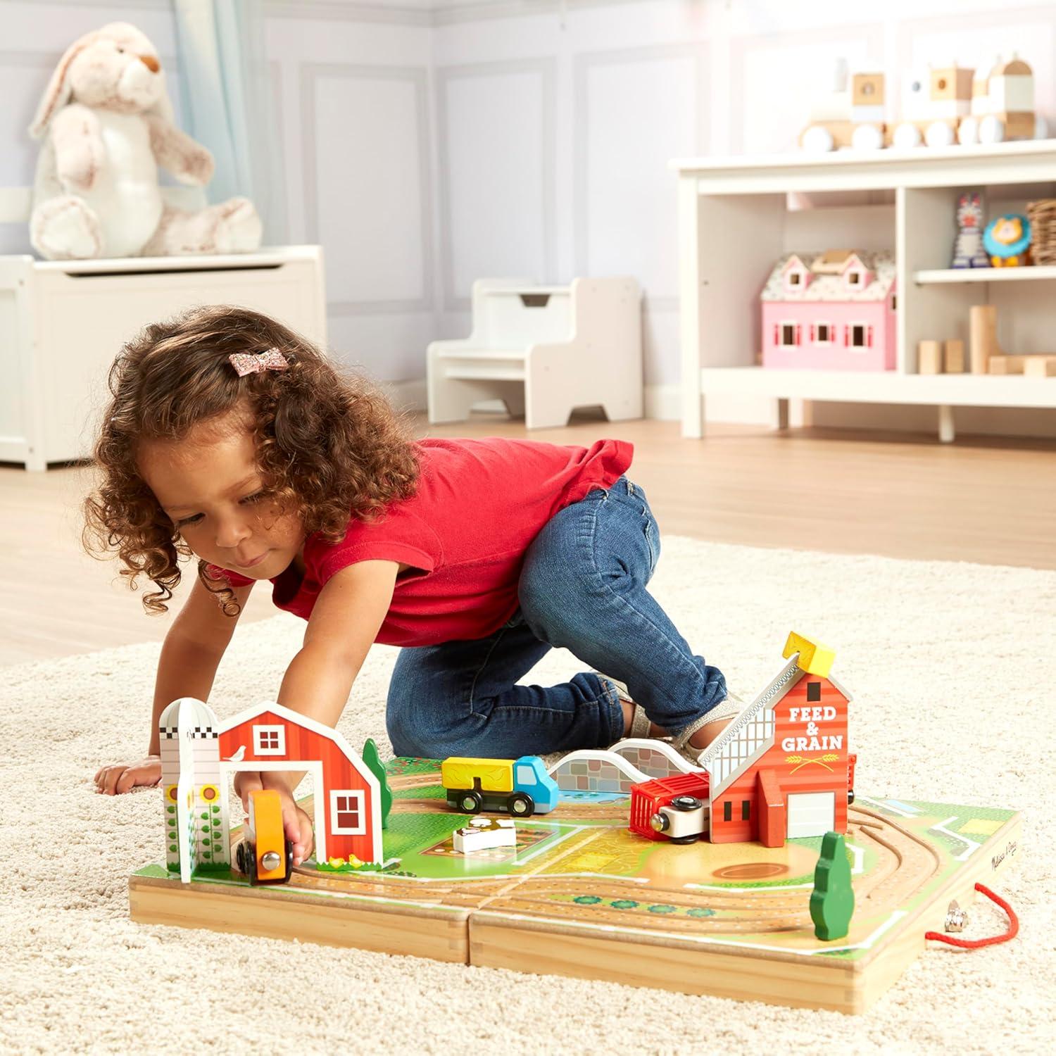 imageMelissa ampamp Doug 17Piece Wooden TakeAlong Tabletop Farm 4 Farm Vehicles Play Pieces Barn Grain House TakeAlong Pretend Play Toy Barn Toys for Toddlers Ages 1