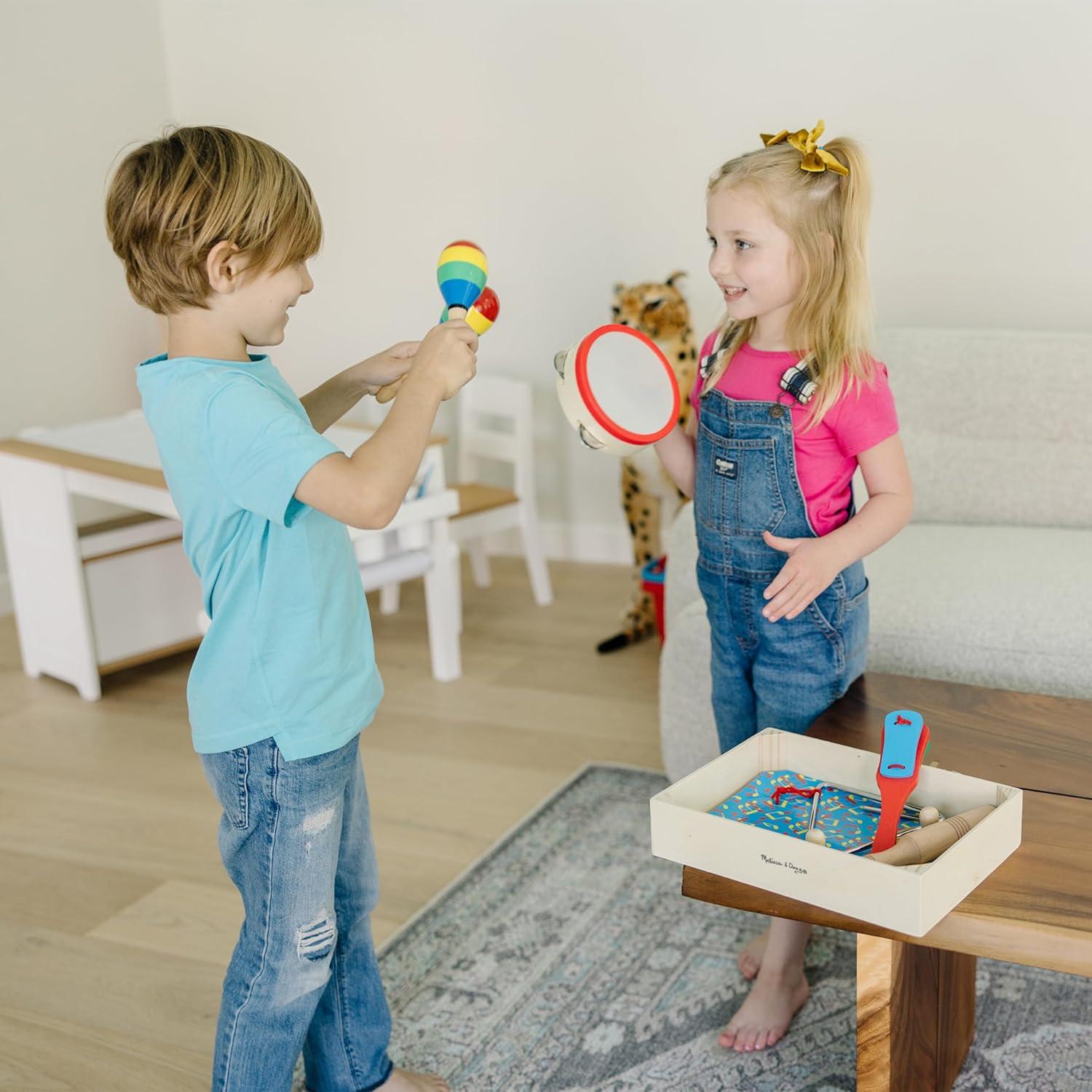 imageMelissa ampamp Doug BandinaBox Clap Clang Tap  10Piece Musical Instrument SetEnglish Only