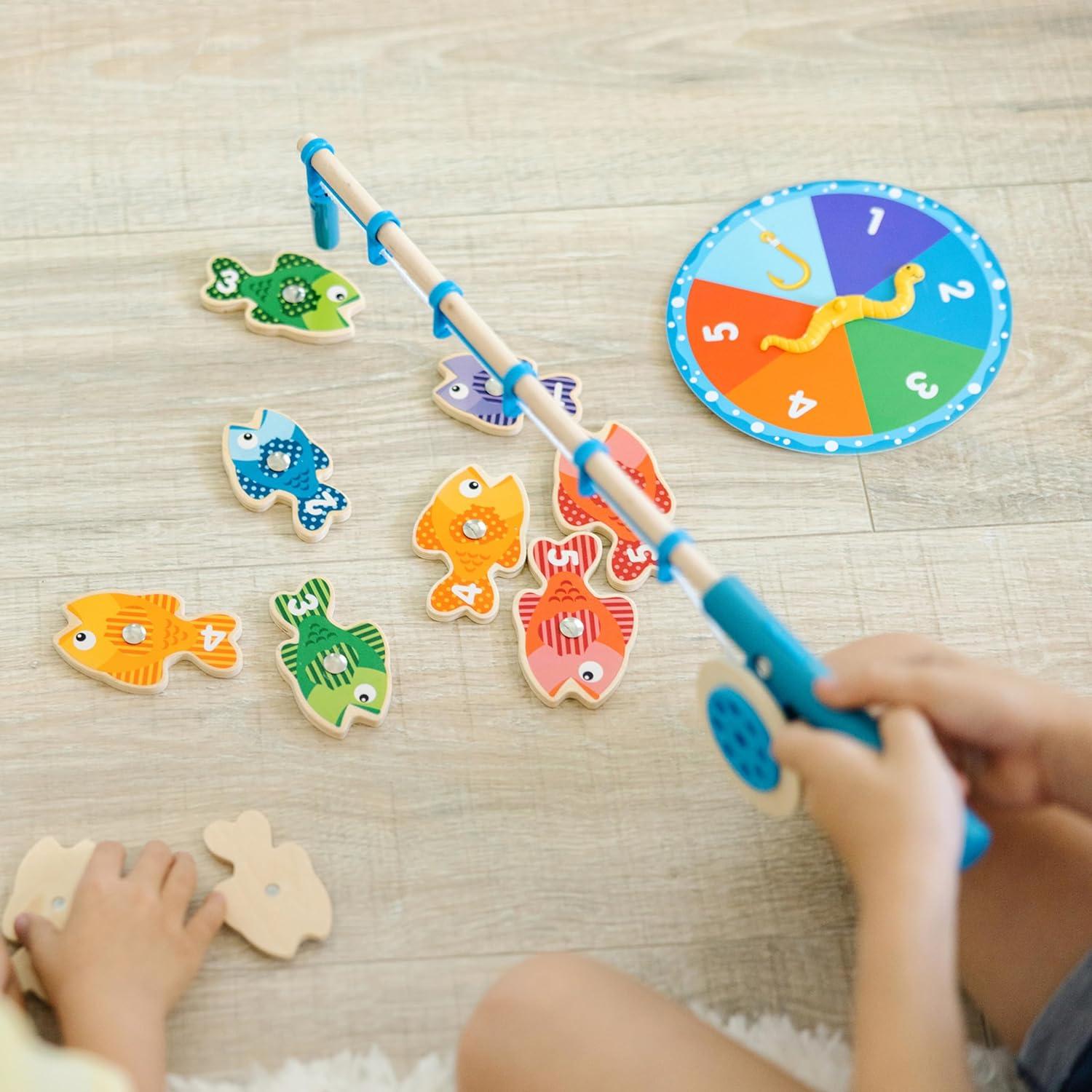 imageMelissa ampamp Doug Catch ampamp Count Wooden Fishing Game with 2 Magnetic RodsStandard Packaging