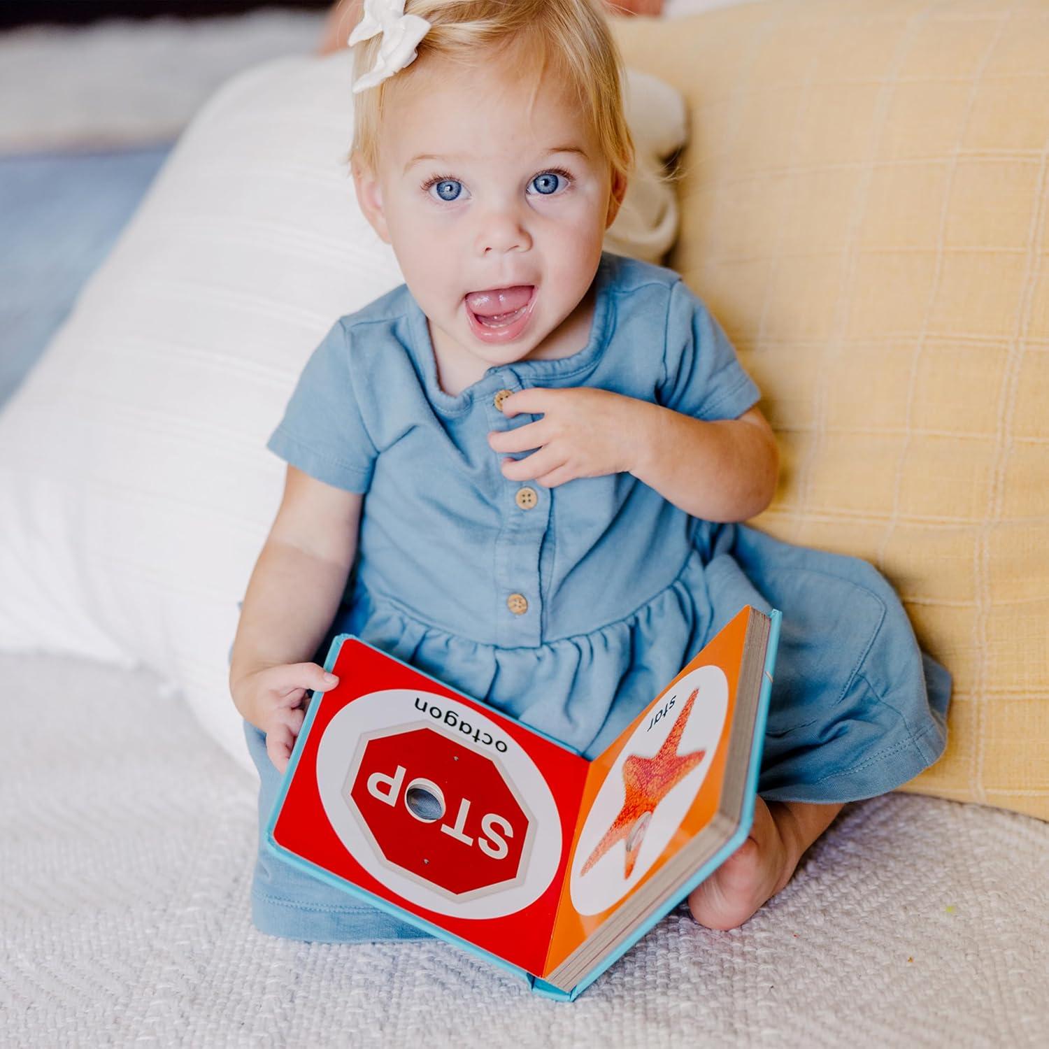 imageMelissa ampamp Doug Childrens Book  PokeaDot First Shapes Board Book with Buttons to Pop