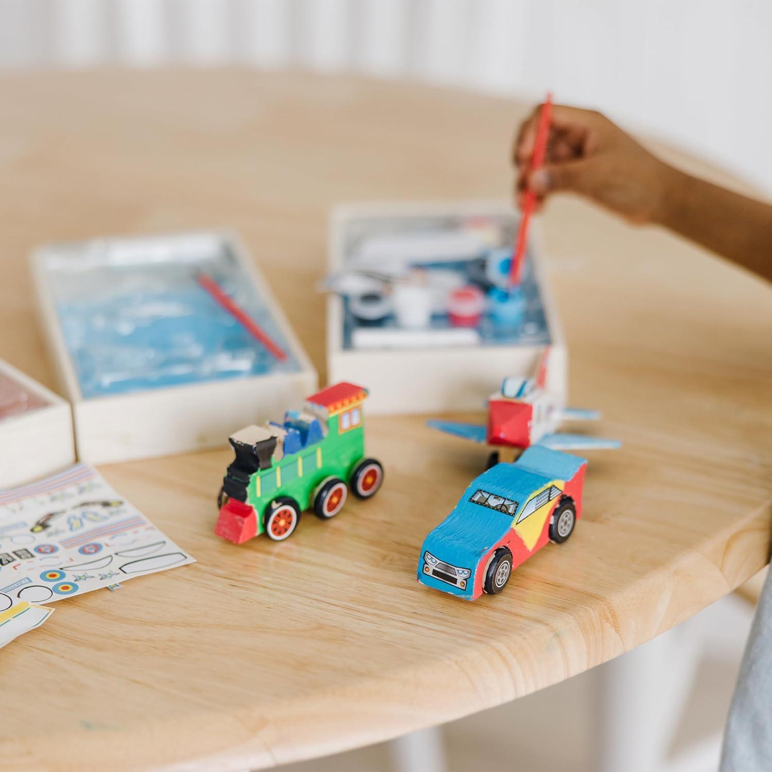 imageMelissa ampamp Doug DecorateYourOwn Wooden Craft Kits Set  Plane Train and Race Car