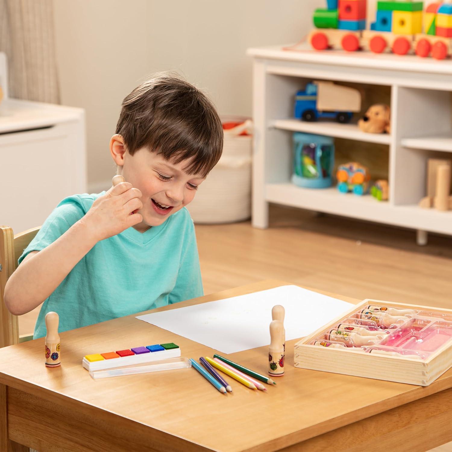 imageMelissa ampamp Doug Deluxe Happy Handle Stamp Set with 10 Stamps 5 Colored Pencils and 6Color Washable Ink Pad