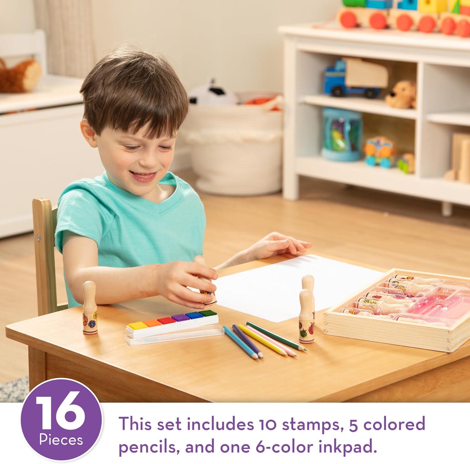 imageMelissa ampamp Doug Deluxe Happy Handle Stamp Set with 10 Stamps 5 Colored Pencils and 6Color Washable Ink Pad