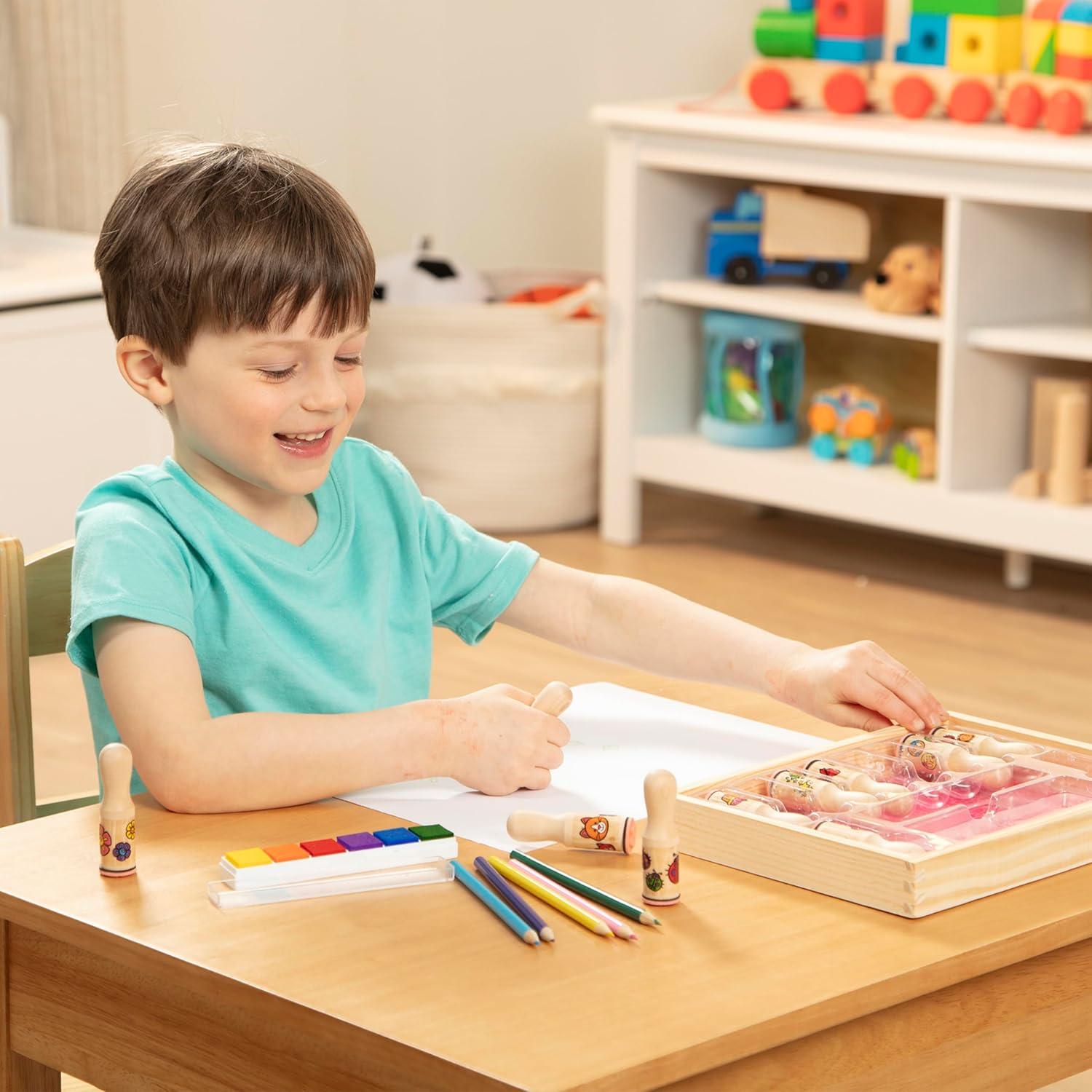 imageMelissa ampamp Doug Deluxe Happy Handle Stamp Set with 10 Stamps 5 Colored Pencils and 6Color Washable Ink Pad