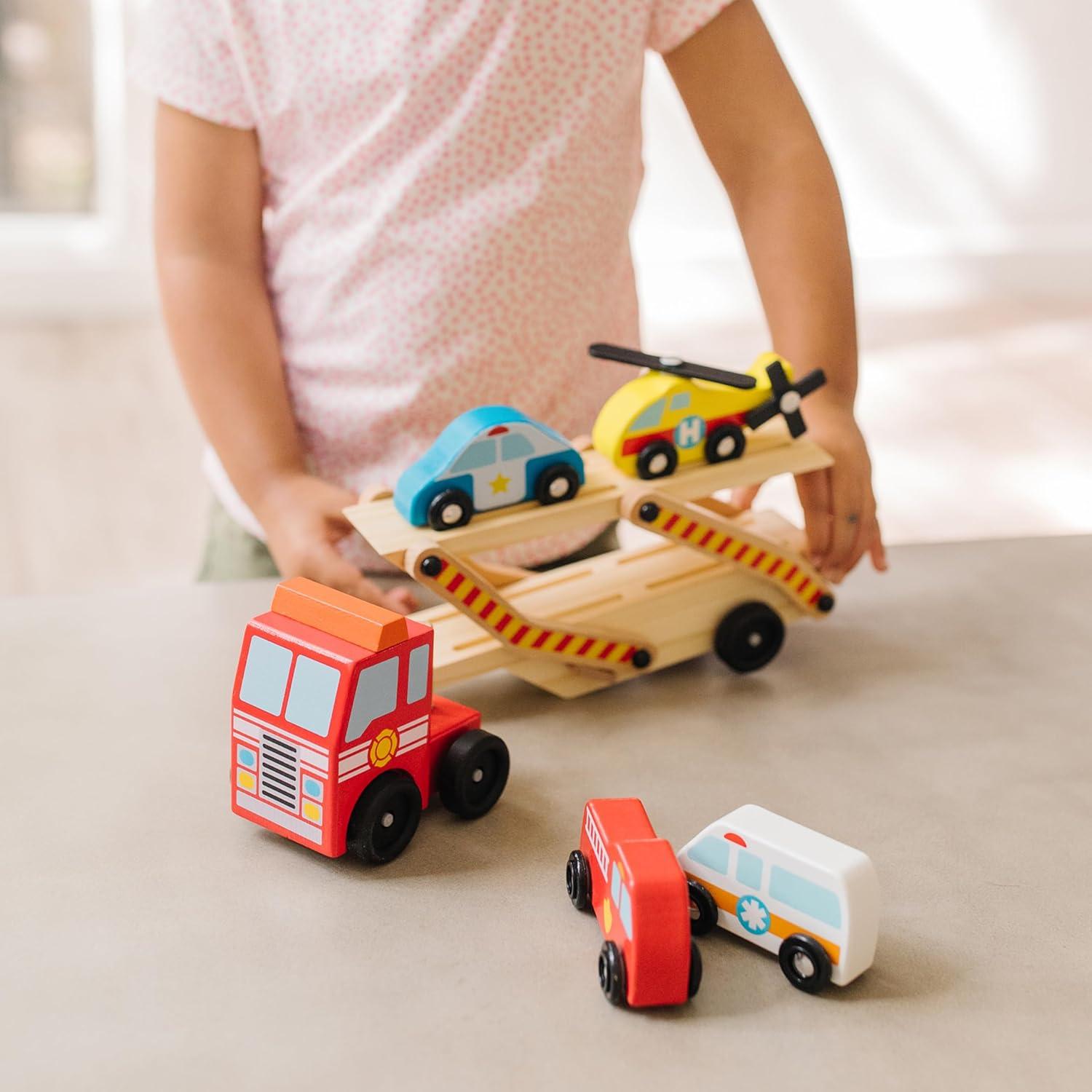 imageMelissa ampamp Doug Emergency Vehicle Carrier Wooden Truck with 4 Rescue VehiclesEnglish Only