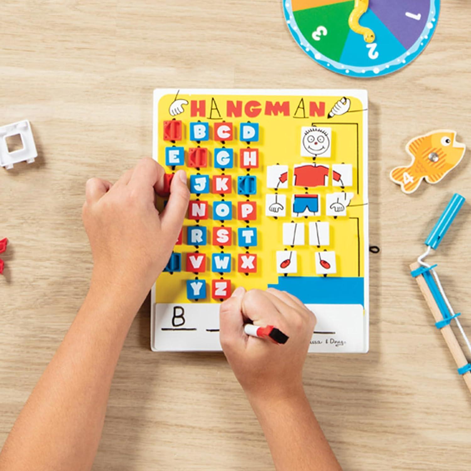imageMelissa ampamp Doug Flip to Win Travel Hangman Game  White Board DryErase Marker