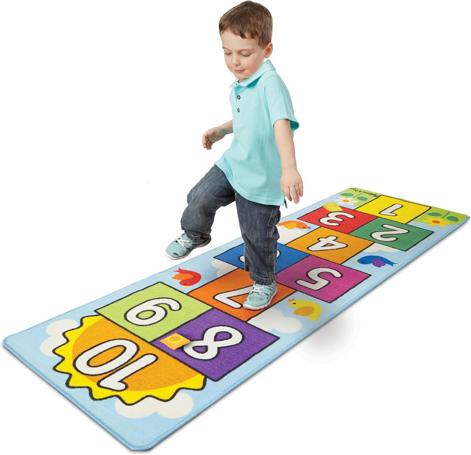 imageMelissa ampamp Doug Hop and Count Hopscotch Game Rug 3 pcs 785 x 265 inches Classic Hopscotch Rug for KidsRug