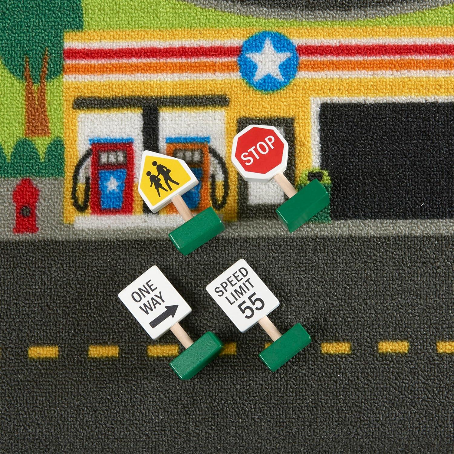 imageMelissa ampamp Doug Jumbo Roadway Activity Rug 4 Wooden Traffic Signs 79quot L X 60quot W Pretend Play Road Activity RugFrustrationFree Packaging