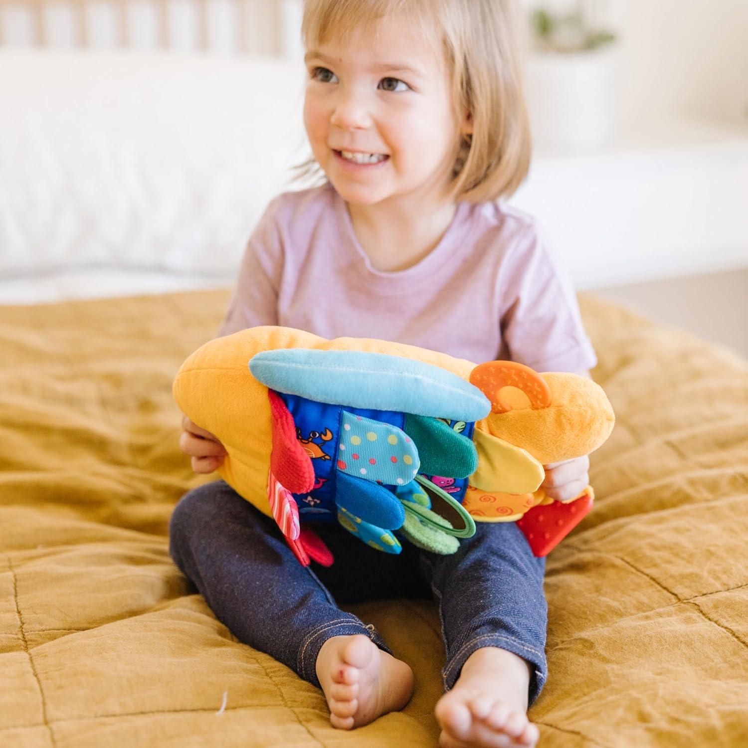 imageMelissa ampamp Doug Ks Kids Flip Fish Stuffed Animal Soft Baby Book MultiTextured Squeaking ampamp Crinkling Infant Sensory Toys for Babies with Baby Mirror Tummy Time Toys for Infants Ages 09 Months