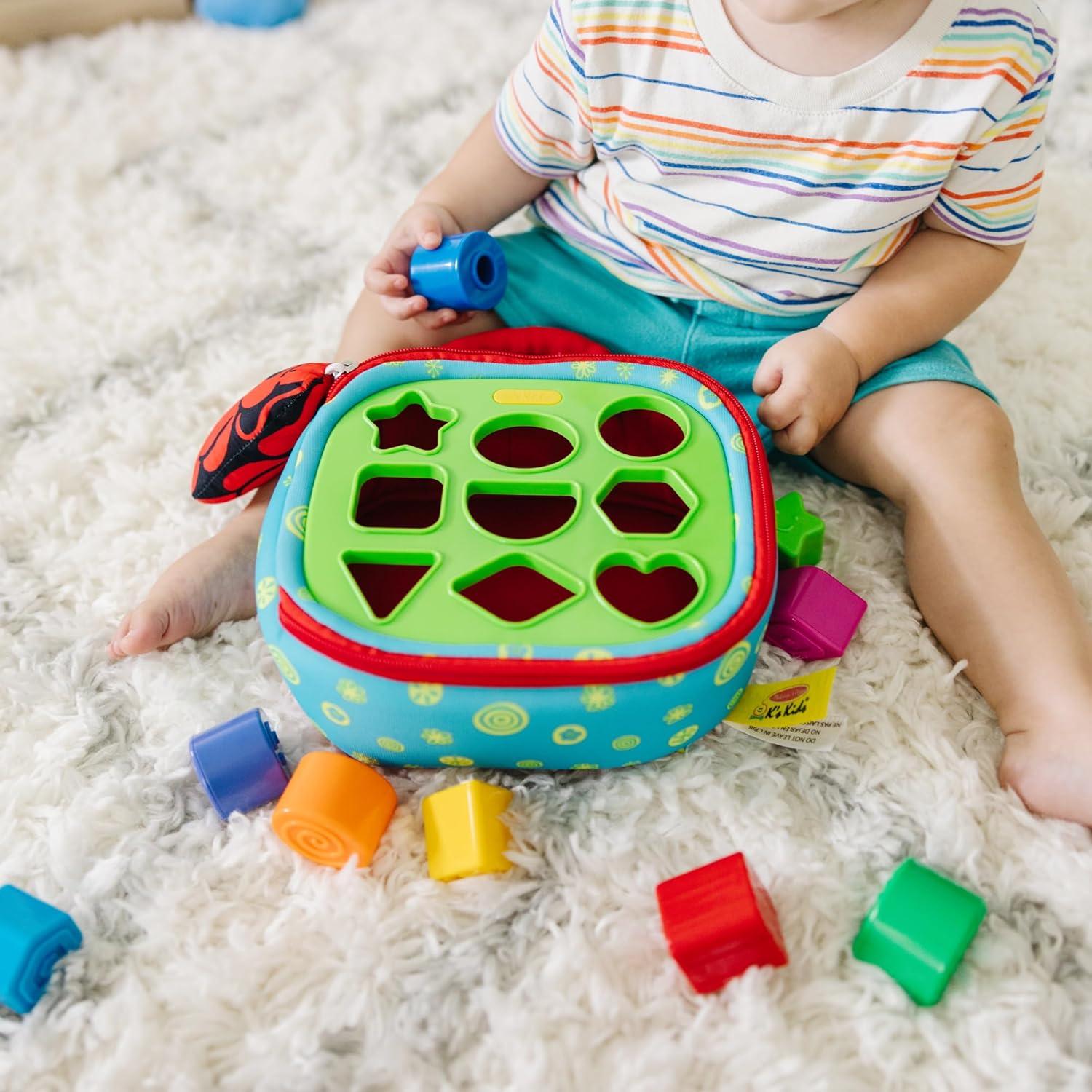 imageMelissa ampamp Doug Ks Kids TakeAlong Shape Sorter Baby Toy with 2Sided Activity Bag and 9 Textured Shape Blocks Sensory Toys Travel Shape Sorter Toys for Toddlers and Infants