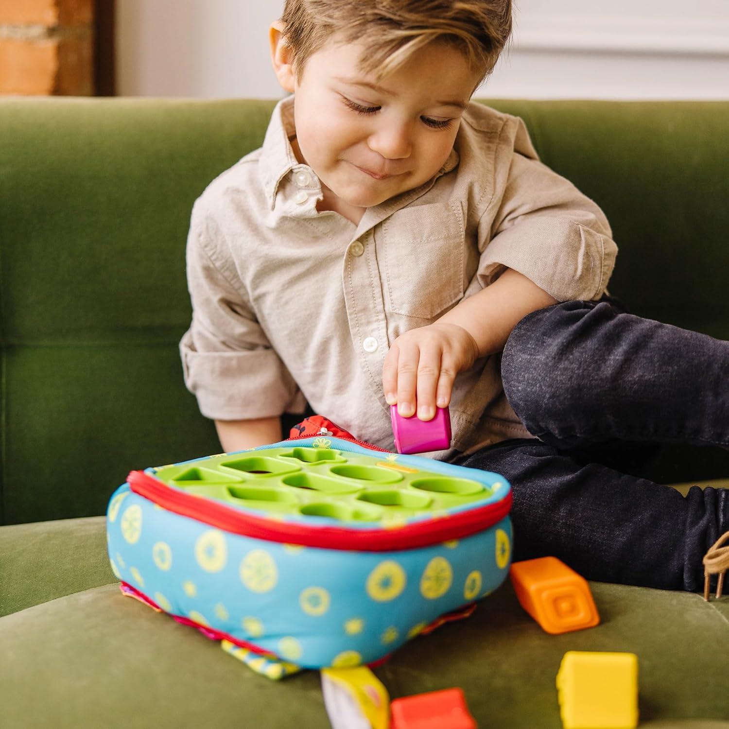 imageMelissa ampamp Doug Ks Kids TakeAlong Shape Sorter Baby Toy with 2Sided Activity Bag and 9 Textured Shape Blocks Sensory Toys Travel Shape Sorter Toys for Toddlers and Infants
