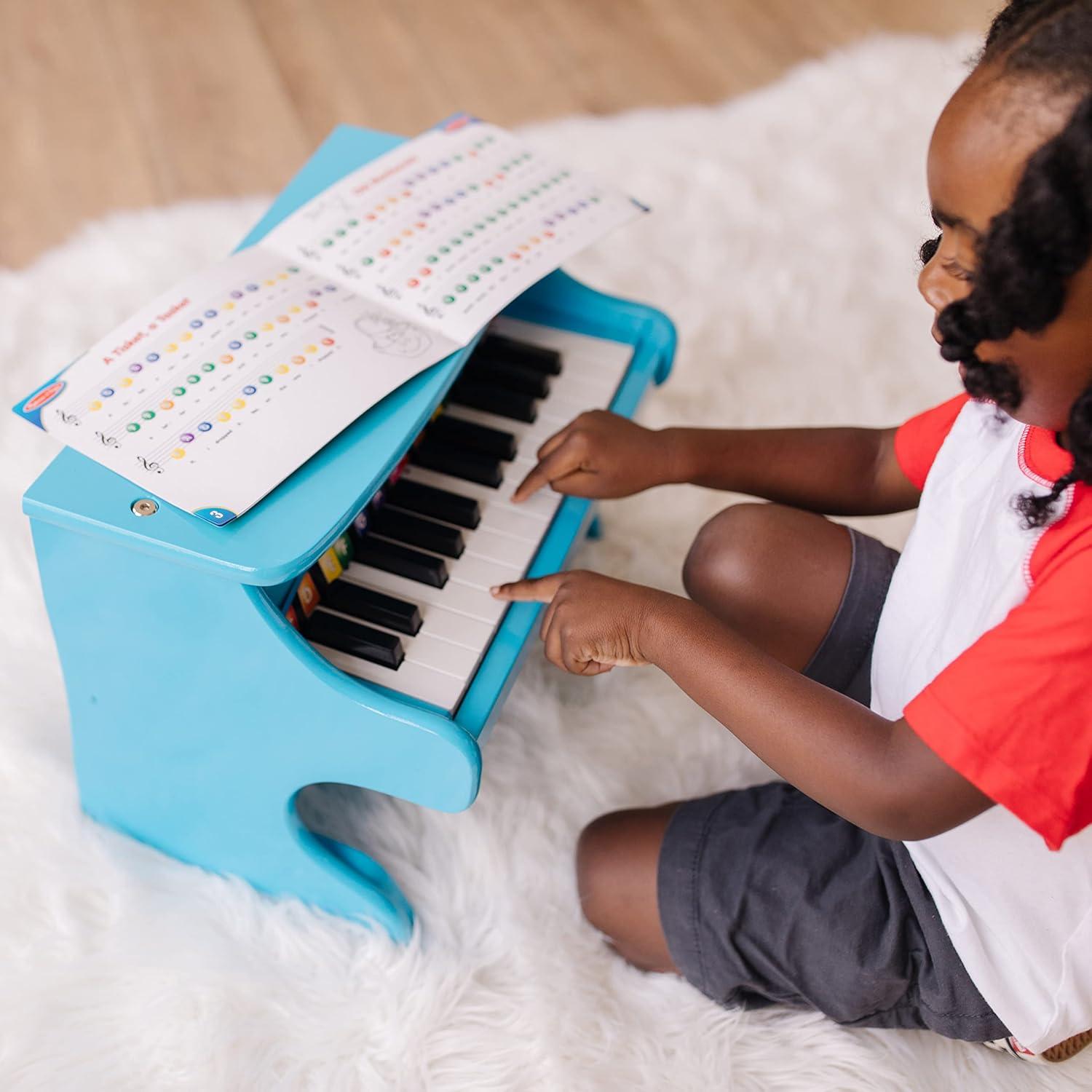 imageMelissa ampamp Doug LearntoPlay Piano with 25 Keys and ColorCoded Songbook  BluePlay Piano