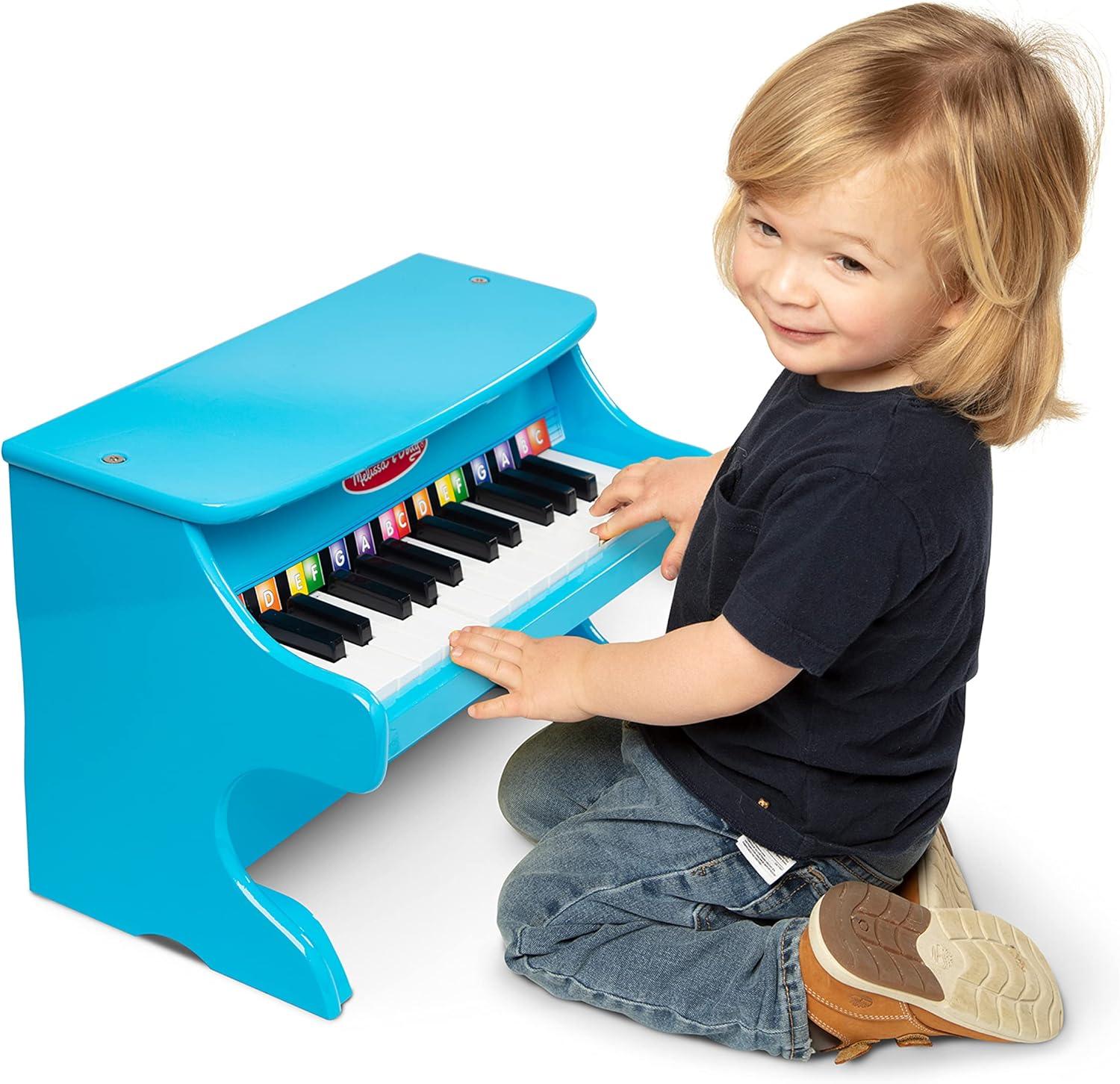 imageMelissa ampamp Doug LearntoPlay Piano with 25 Keys and ColorCoded Songbook  BluePlay Piano