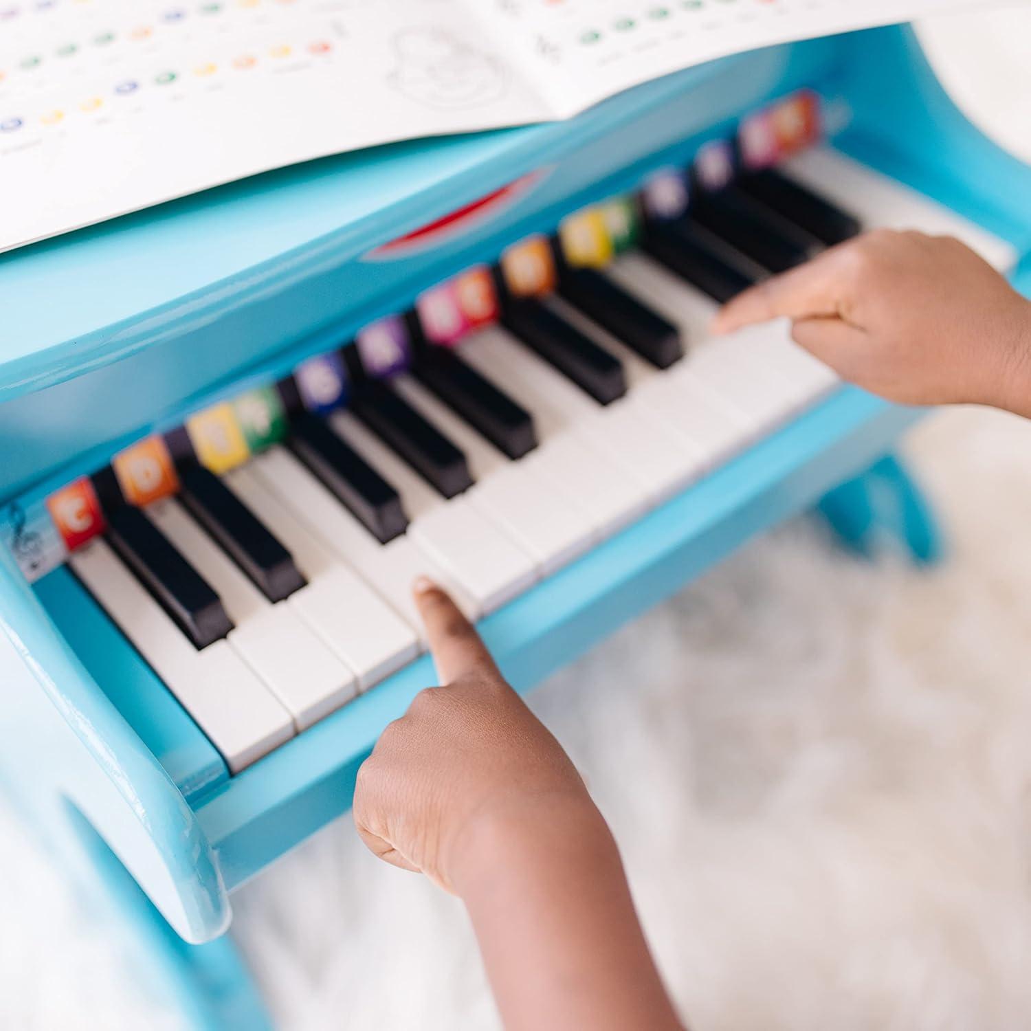 imageMelissa ampamp Doug LearntoPlay Piano with 25 Keys and ColorCoded Songbook  BluePlay Piano