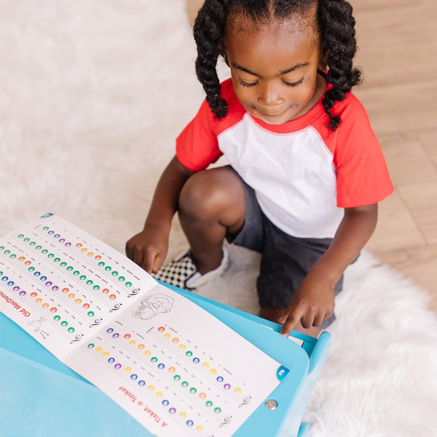 imageMelissa ampamp Doug LearntoPlay Piano with 25 Keys and ColorCoded Songbook  BluePlay Piano