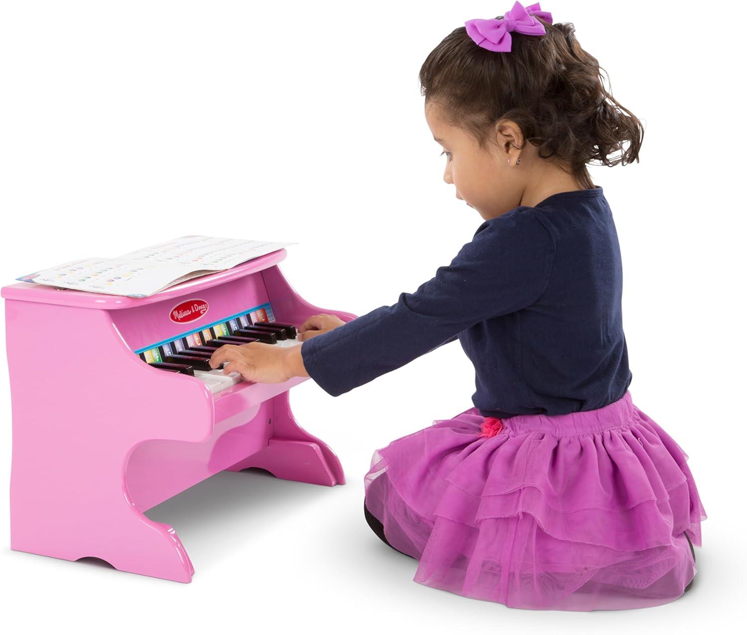 imageMelissa ampamp Doug LearntoPlay Pink Piano with 25 Keys and ColorCoded Songbook