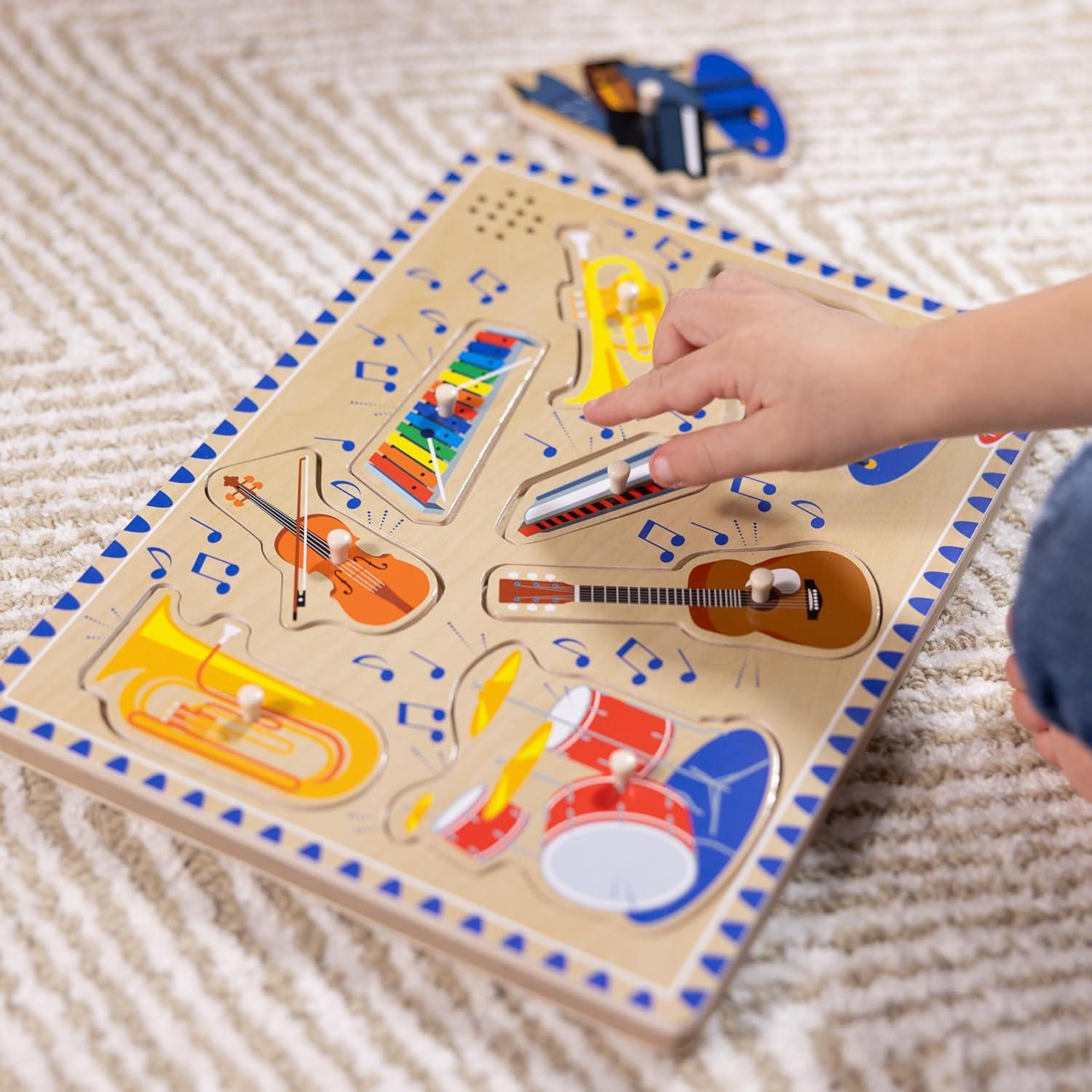 imageMelissa ampamp Doug Musical Instruments Sound Puzzle  Wooden Peg Puzzle with LightActivated Sound Effects 8 pcs Wooden Peg Baby Music Learning Toys for Toddlers and Preschoolers Ages 2