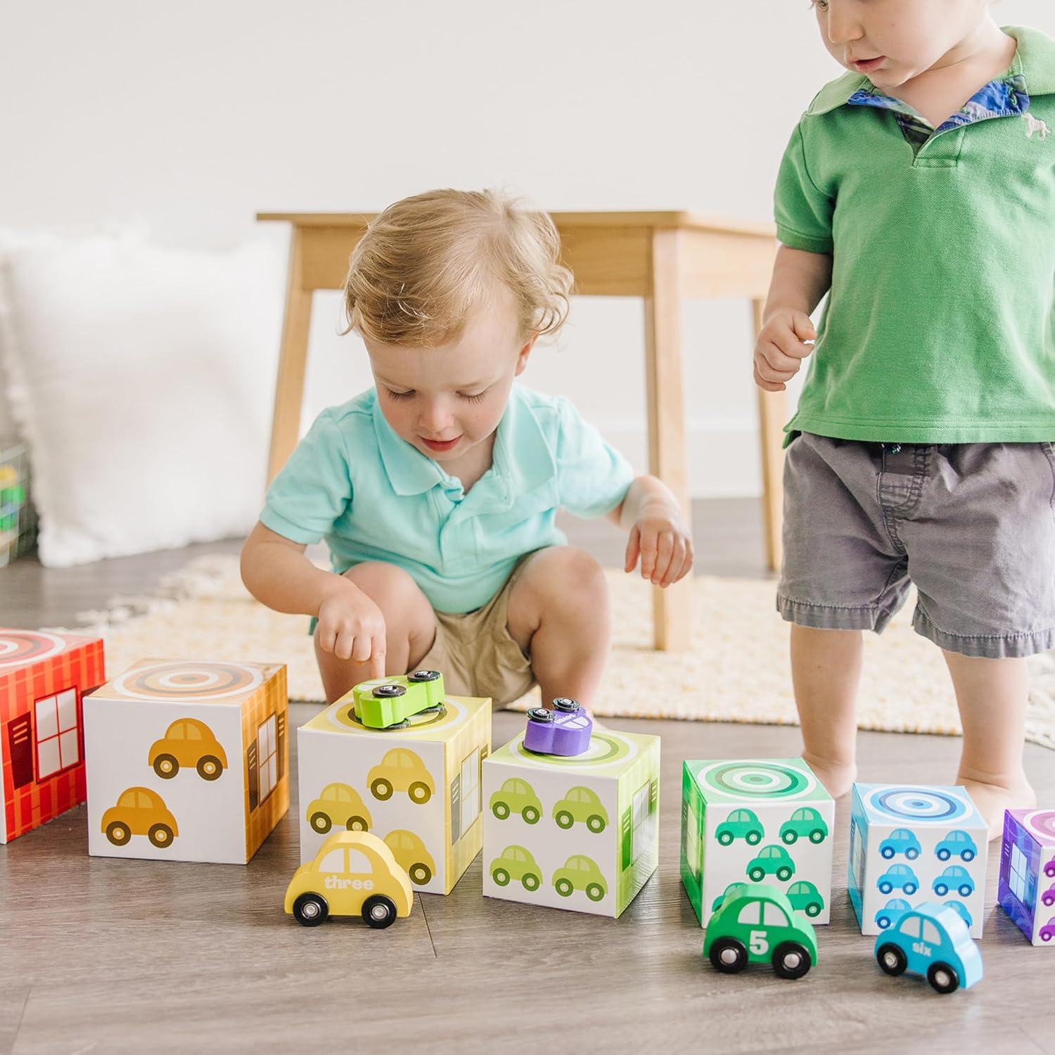 imageMelissa ampamp Doug Nesting and Sorting Garages and Cars with 7 Graduated Garages and 7 Stackable Wooden Cars  FSC Certified