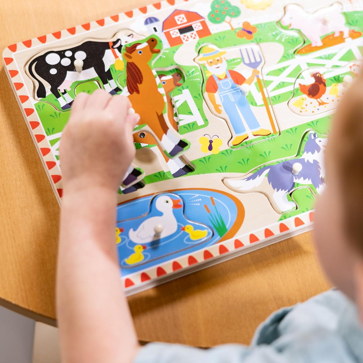 imageMelissa ampamp Doug Old MacDonalds Farm Song Puzzle  8Piece Wooden Peg Puzzle with LightActivated Sounds Music Learning Toy for Toddlers and Preschoolers Ages 2