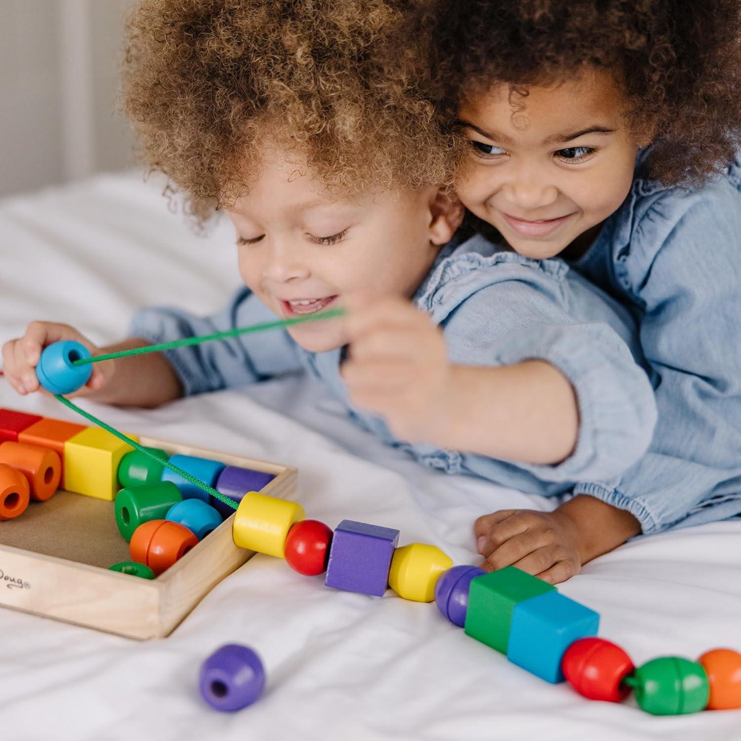 imageMelissa ampamp Doug Primary Lacing Beads  Educational Toy with 30 Wooden Beads and 2 Laces for Toddlers Fine Motor Skills Lacing Toys for Toddlers and Kids Ages 3