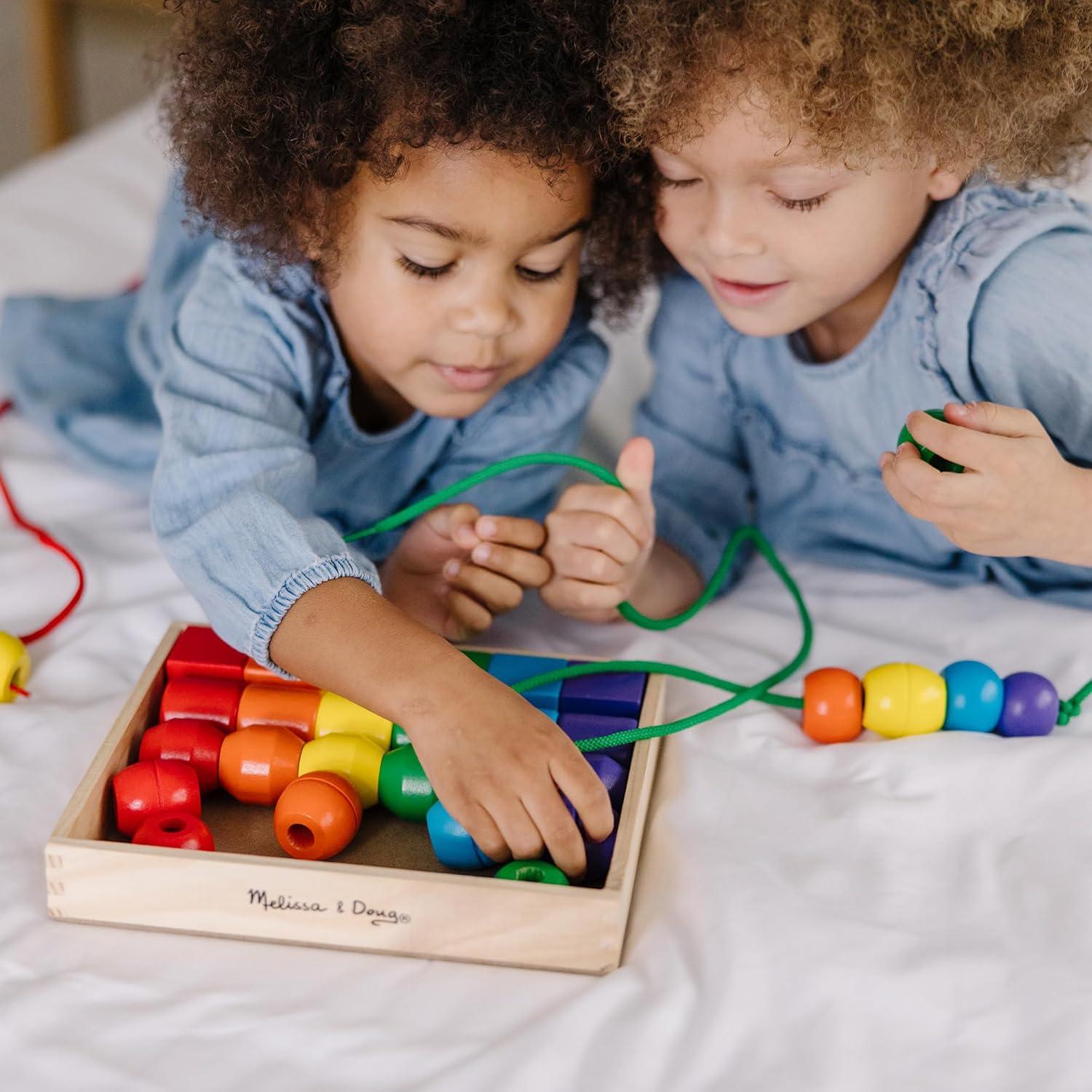 imageMelissa ampamp Doug Primary Lacing Beads  Educational Toy with 30 Wooden Beads and 2 Laces for Toddlers Fine Motor Skills Lacing Toys for Toddlers and Kids Ages 3