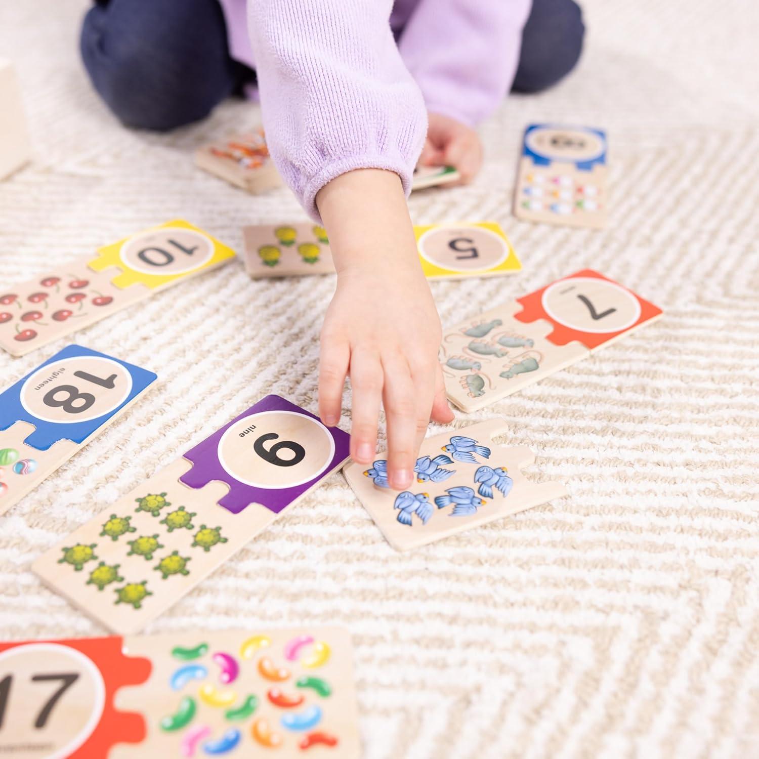imageMelissa ampamp Doug SelfCorrecting Wooden Number Puzzles with Storage Box 40 pcs