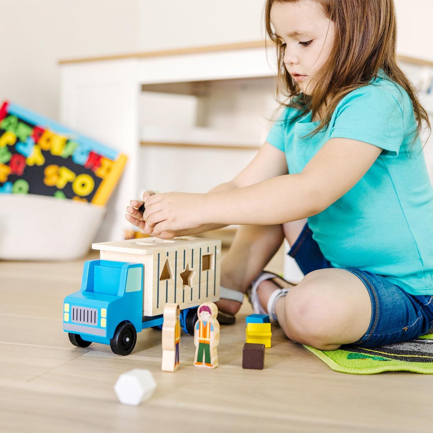 imageMelissa ampamp Doug ShapeSorting Wooden Dump Truck Toy with 9 Colorful Shapes and 2 Play Figures Wooden Vehicle Toys Shape Sorter Toys for Toddlers Ages 2