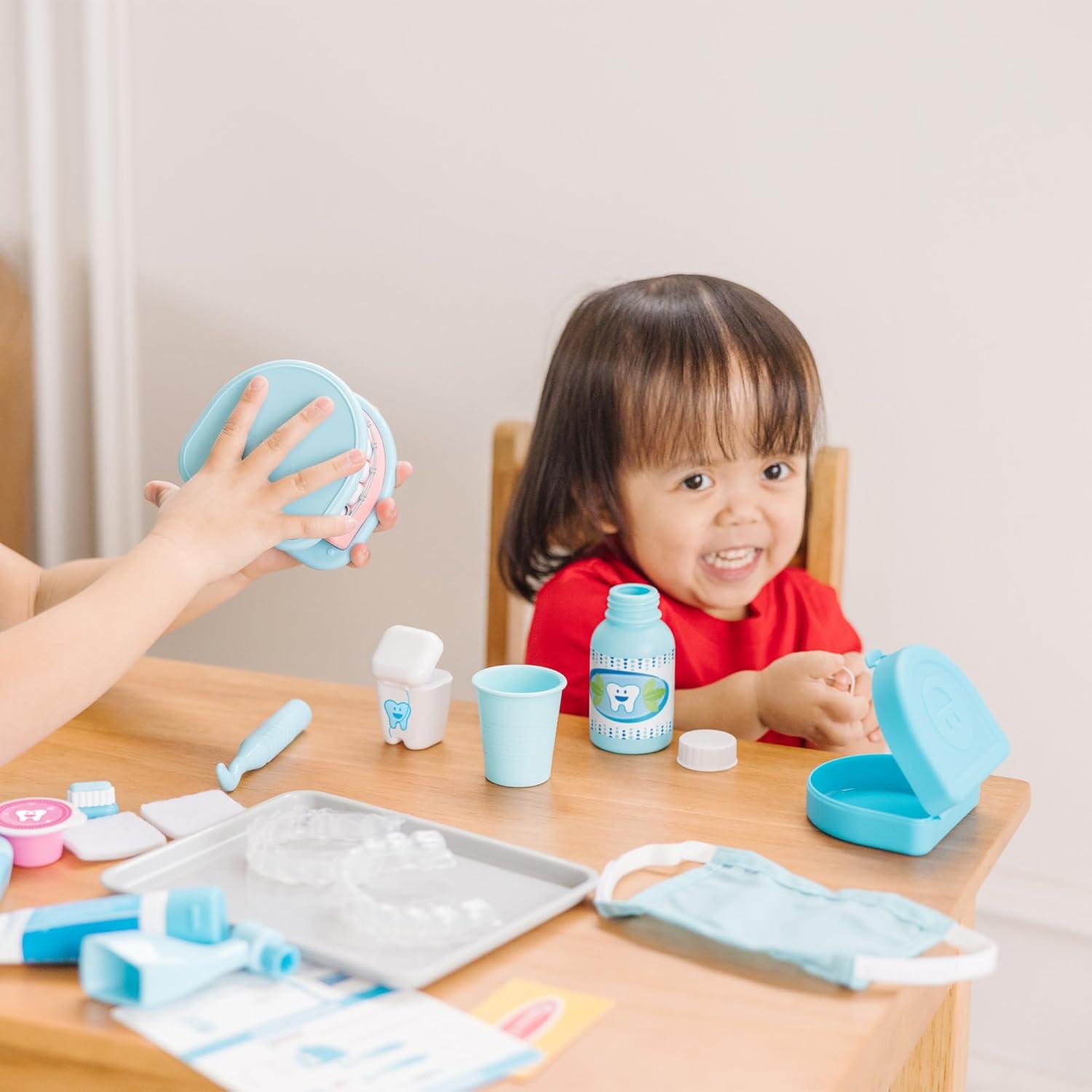 imageMelissa ampamp Doug Super Smile Dentist Play Set 25Piece Dentist Kit with Oversized Teeth Large Tools ampamp Accessories Kids Toys for Girls ampamp Boys 3