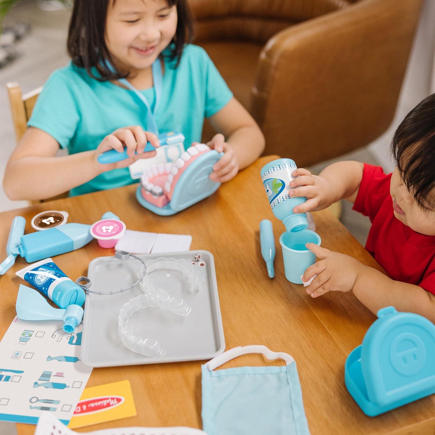 imageMelissa ampamp Doug Super Smile Dentist Play Set 25Piece Dentist Kit with Oversized Teeth Large Tools ampamp Accessories Kids Toys for Girls ampamp Boys 3