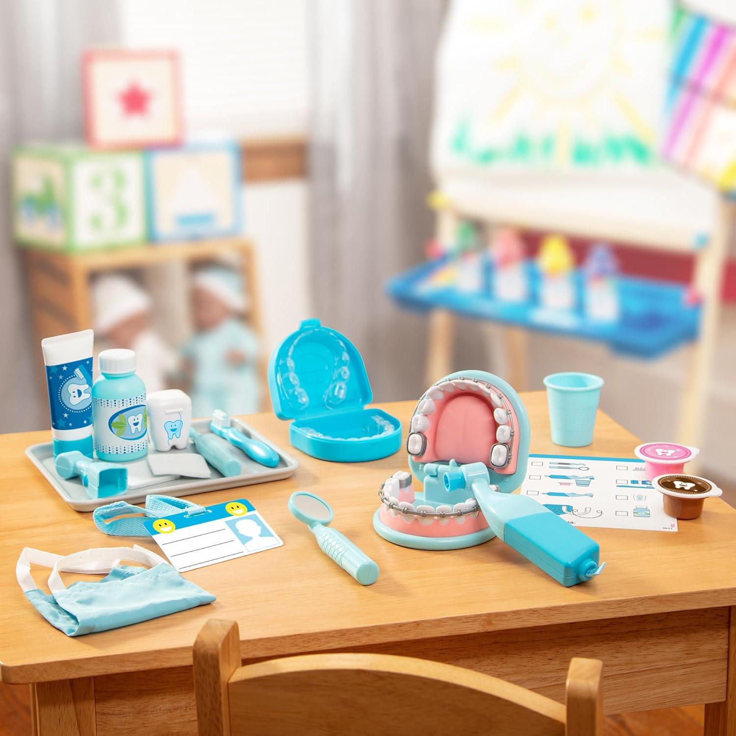 imageMelissa ampamp Doug Super Smile Dentist Play Set 25Piece Dentist Kit with Oversized Teeth Large Tools ampamp Accessories Kids Toys for Girls ampamp Boys 3