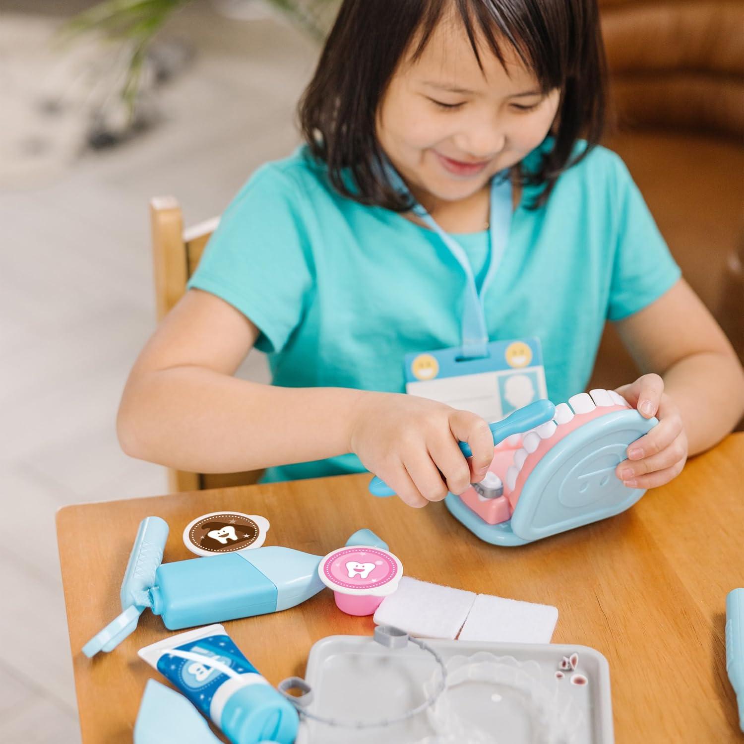 imageMelissa ampamp Doug Super Smile Dentist Play Set 25Piece Dentist Kit with Oversized Teeth Large Tools ampamp Accessories Kids Toys for Girls ampamp Boys 3
