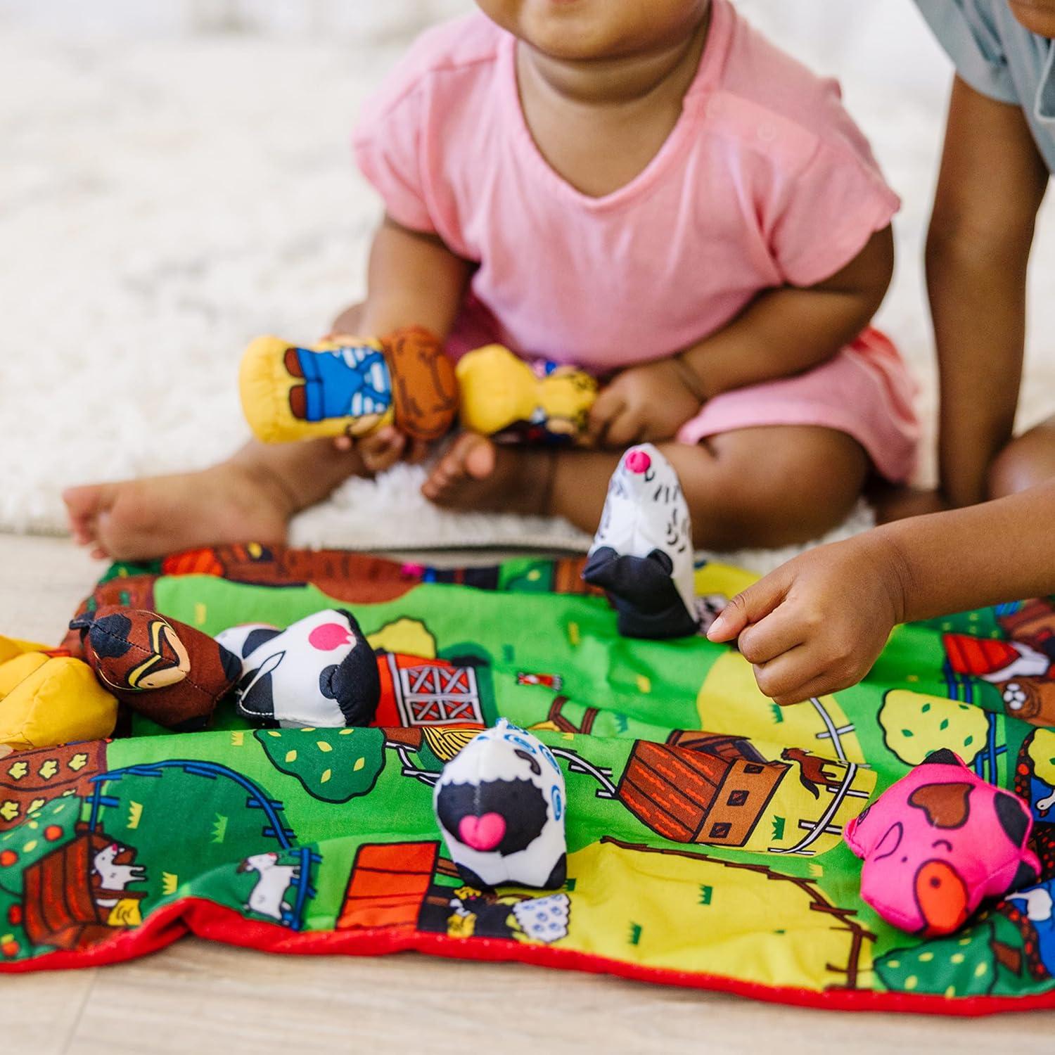 imageMelissa ampamp Doug TakeAlong Farm Baby and Toddler Play Mat 1925 x 145 inches With 9 Animals  Folds To Be Convenient Storage Bag for Travel