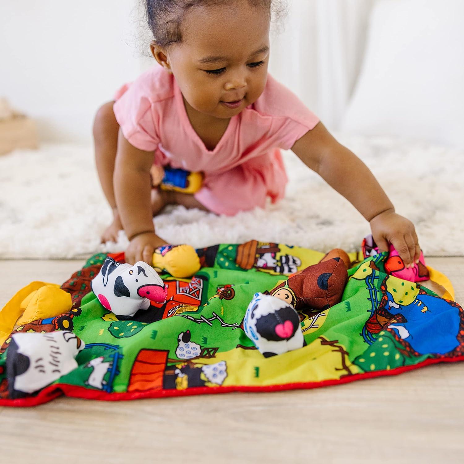 imageMelissa ampamp Doug TakeAlong Farm Baby and Toddler Play Mat 1925 x 145 inches With 9 Animals  Folds To Be Convenient Storage Bag for Travel