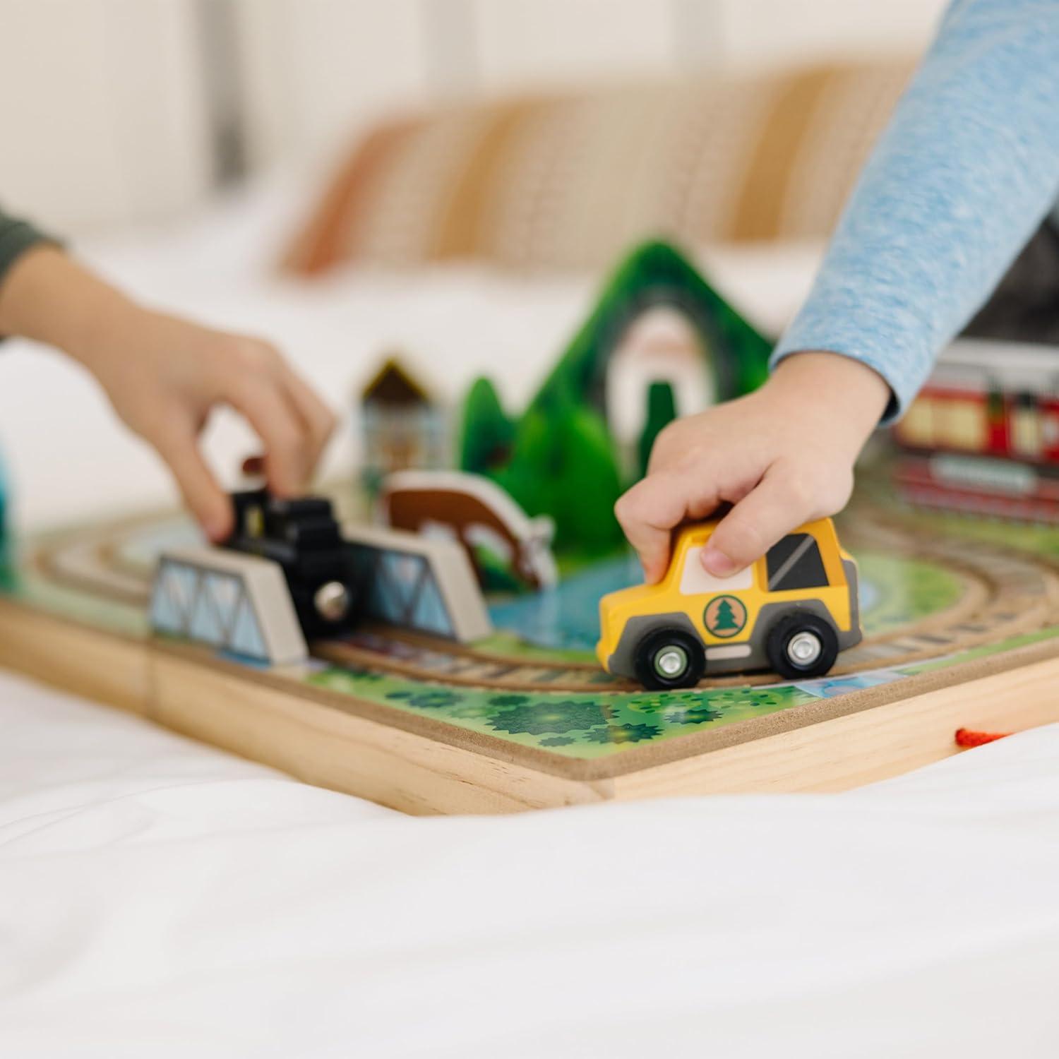 imageMelissa ampamp Doug TakeAlong Railroad Tabletop Playset with Wooden Train Toys Animals ampamp Scenery Play Pieces Preschool Learning Toys for Girls ampamp Boys 3  FSC CertifiedTrain