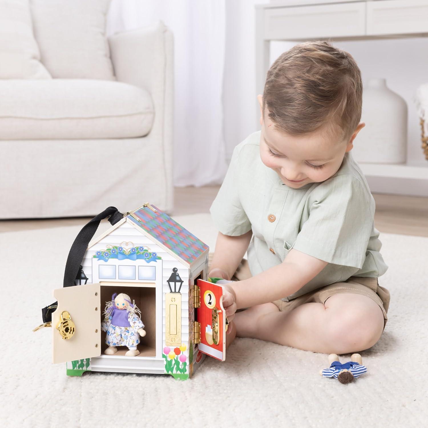 imageMelissa ampamp Doug TakeAlong Wooden Doorbell Dollhouse  Doorbell Sounds Keys 4 Poseable Wooden Dolls Portable Doll House Doorbell House for Kids Ages 3