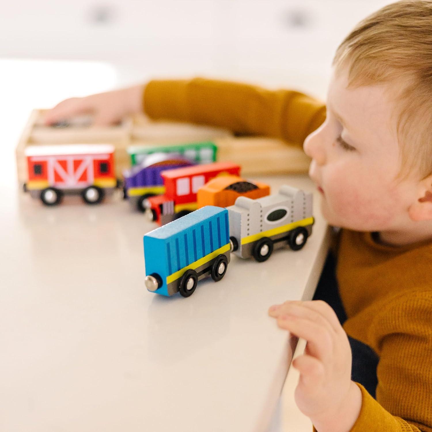 imageMelissa ampamp Doug Wooden Magnetic Train Cars  8 Piece Educational and SkillBuilding Wooden Toy for Boys and Girls