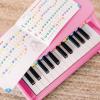 imageMelissa ampamp Doug LearntoPlay Pink Piano with 25 Keys and ColorCoded Songbook